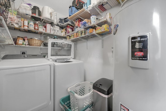 509 Section Line Dr, South Charleston, OH 45368 - clothes washing area featuring separate washer and dryer and water heater