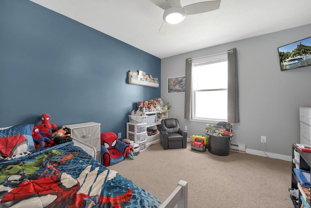 509 Section Line Dr, South Charleston, OH 45368 - carpeted bedroom featuring baseboards, ceiling fan, and baseboard heating