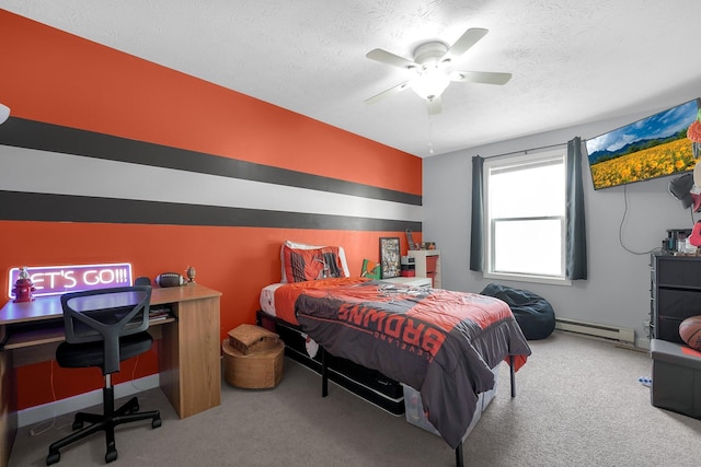 509 Section Line Dr, South Charleston, OH 45368 - bedroom with carpet flooring, a baseboard radiator, a textured ceiling, and ceiling fan