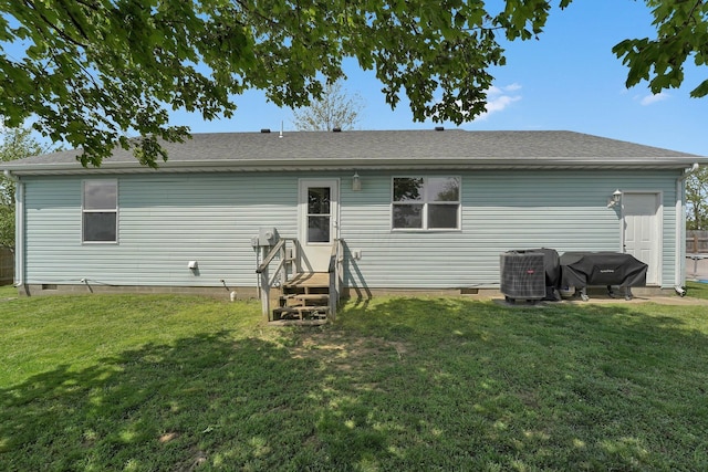 509 Section Line Dr, South Charleston, OH 45368 - rear view of house with crawl space, entry steps, and a yard