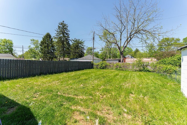 view of yard featuring fence