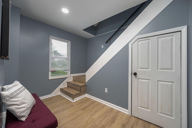1828 Ferris Rd, Columbus, OH 43224 - sitting room featuring stairs, light wood-type flooring, and recessed lighting