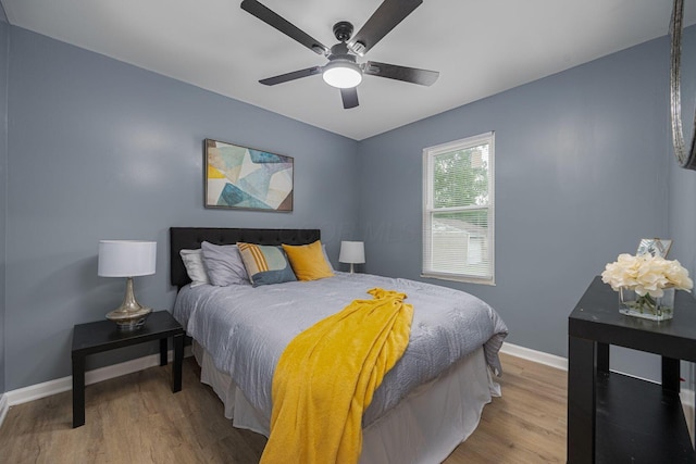 1828 Ferris Rd, Columbus, OH 43224 - bedroom with wood finished floors and a ceiling fan