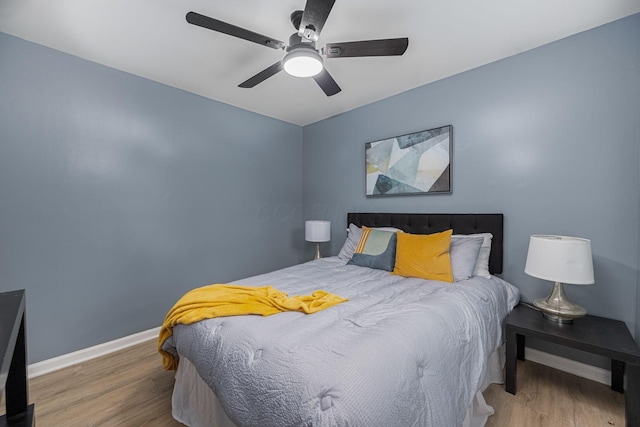 1828 Ferris Rd, Columbus, OH 43224 - bedroom with wood finished floors and ceiling fan
