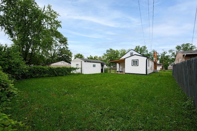 1828 Ferris Rd, Columbus, OH 43224 - view of yard with a storage unit