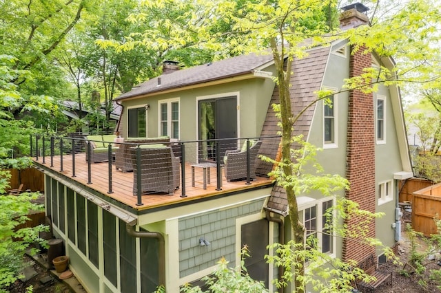 2663 Glen Echo Dr, Columbus, OH 43202 - rear view of house with a chimney, a shingled roof, stucco siding, and a wooden deck