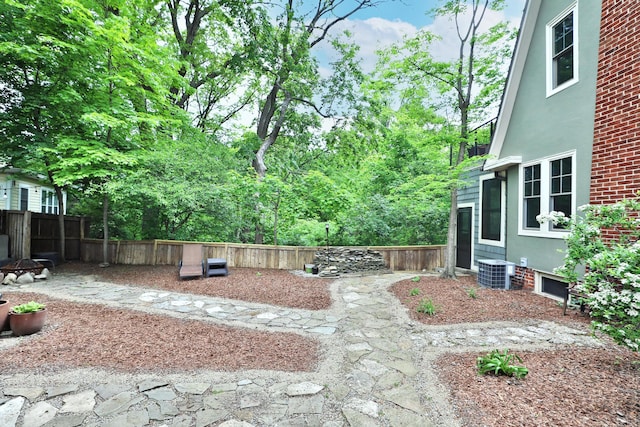2663 Glen Echo Dr, Columbus, OH 43202 - fenced backyard with cooling unit and a fire pit