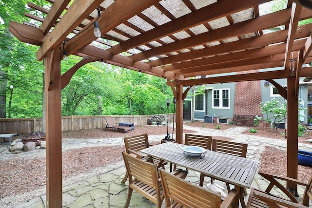 2663 Glen Echo Dr, Columbus, OH 43202 - view of patio / terrace featuring a fire pit, fence, a pergola, and outdoor dining space