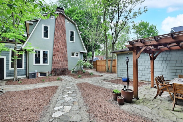2663 Glen Echo Dr, Columbus, OH 43202 - view of yard with a pergola, fence, central AC unit, and a patio area
