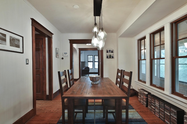 2663 Glen Echo Dr, Columbus, OH 43202 - dining area with wood finished floors, baseboards, and crown molding