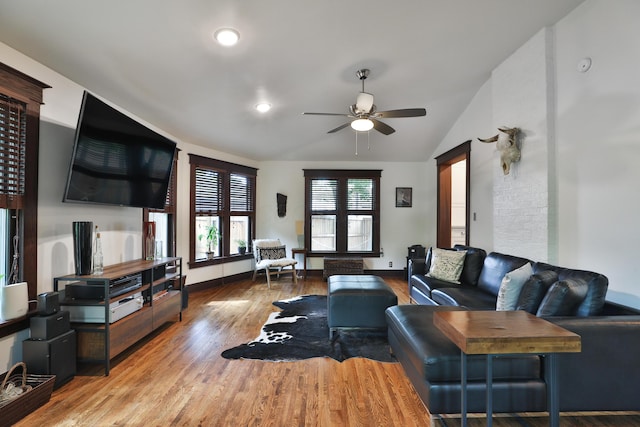 2663 Glen Echo Dr, Columbus, OH 43202 - living room with ceiling fan, wood finished floors, baseboards, and lofted ceiling