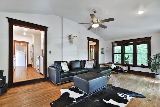 2663 Glen Echo Dr, Columbus, OH 43202 - living area featuring lofted ceiling, light wood-type flooring, and a ceiling fan