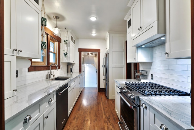 2663 Glen Echo Dr, Columbus, OH 43202 - kitchen with a sink, high quality appliances, backsplash, glass insert cabinets, and white cabinets