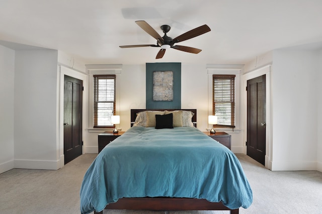 2663 Glen Echo Dr, Columbus, OH 43202 - bedroom with light colored carpet, baseboards, and ceiling fan