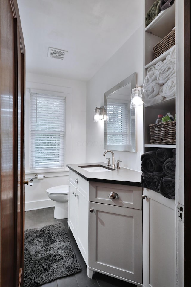 2663 Glen Echo Dr, Columbus, OH 43202 - bathroom with tile patterned flooring, vanity, and toilet