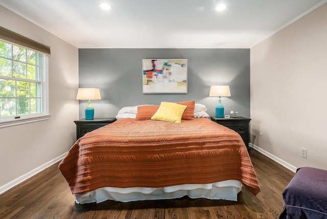 bedroom featuring ornamental molding, baseboards, recessed lighting, and wood finished floors