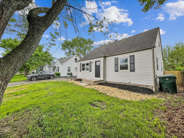 view of front of property featuring a shingled roof