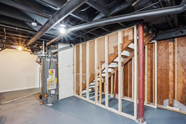 3476 Beulah Rd, Columbus, OH 43224 - unfinished basement featuring water heater and stairway