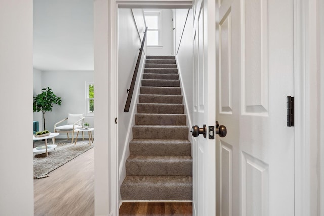 3476 Beulah Rd, Columbus, OH 43224 - stairs with wood finished floors and healthy amount of natural light