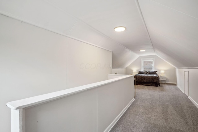 3476 Beulah Rd, Columbus, OH 43224 - carpeted bedroom featuring lofted ceiling and baseboards