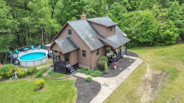 6334 Hansley Rd SE, Sugar Grove, OH 43155 - view of subject property with a pool and a heavily wooded area