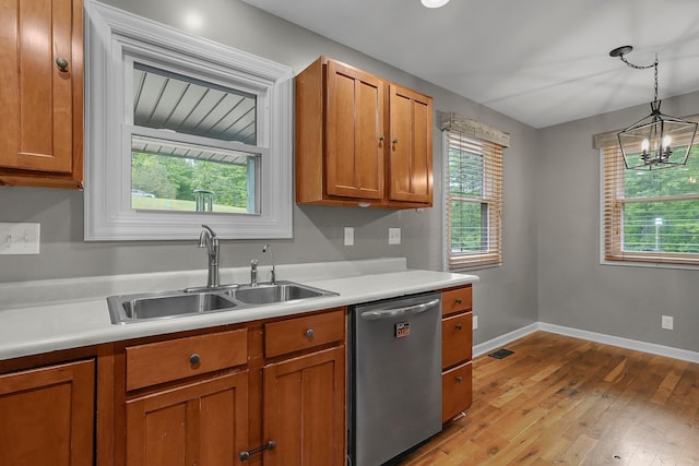 6334 Hansley Rd SE, Sugar Grove, OH 43155 - kitchen featuring dishwasher, a sink, brown cabinets, and healthy amount of natural light