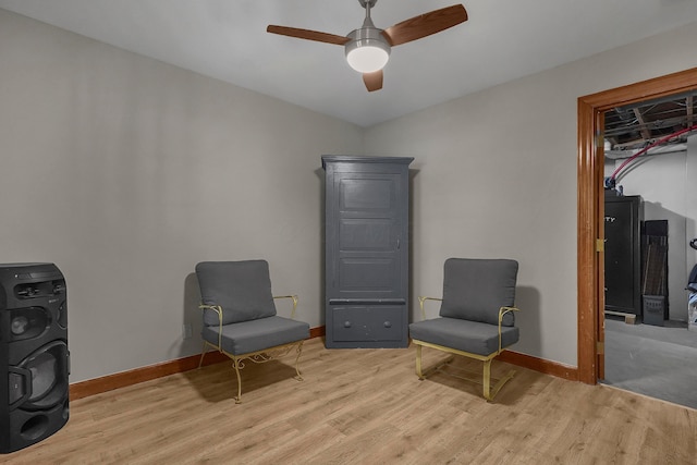 6334 Hansley Rd SE, Sugar Grove, OH 43155 - living area featuring wood finished floors, baseboards, and ceiling fan
