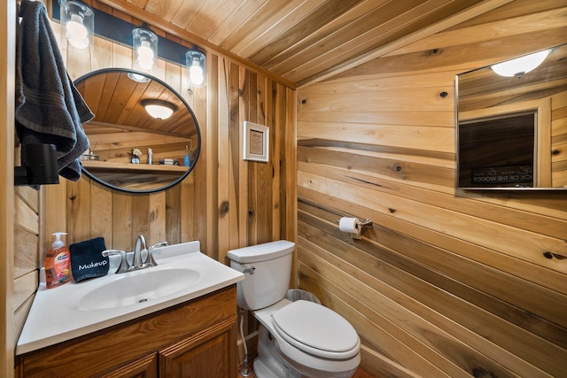 18156 Thompson Ridge Rd, Laurelville, OH 43135 - bathroom featuring toilet, wooden walls, vanity, wood ceiling, and vaulted ceiling