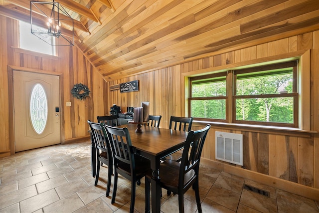 18156 Thompson Ridge Rd, Laurelville, OH 43135 - dining area featuring wood walls, a chandelier, and lofted ceiling