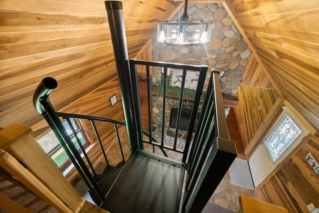 18156 Thompson Ridge Rd, Laurelville, OH 43135 - stairway featuring healthy amount of natural light and wood walls