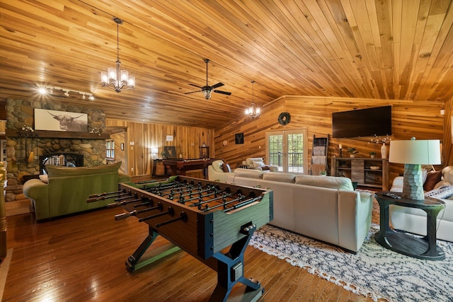 18156 Thompson Ridge Rd, Laurelville, OH 43135 - rec room with wood walls, ceiling fan, wood-type flooring, wood ceiling, and a chandelier