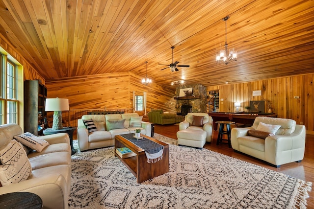 18156 Thompson Ridge Rd, Laurelville, OH 43135 - living area featuring wooden walls, a chandelier, wooden ceiling, a ceiling fan, and lofted ceiling