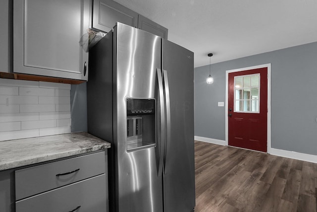 2433 Nedra St, Grove City, OH 43123 - kitchen featuring stainless steel fridge, gray cabinetry, tasteful backsplash, dark wood-style floors, and light countertops