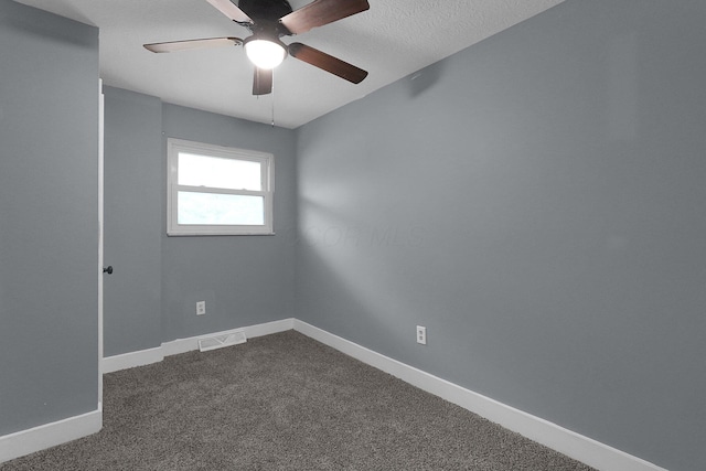 2433 Nedra St, Grove City, OH 43123 - unfurnished room with a ceiling fan and dark carpet