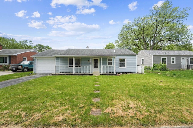 407 Yarmouth Ln, Columbus, OH 43228 - ranch-style home with a porch, an attached garage, asphalt driveway, and a front yard