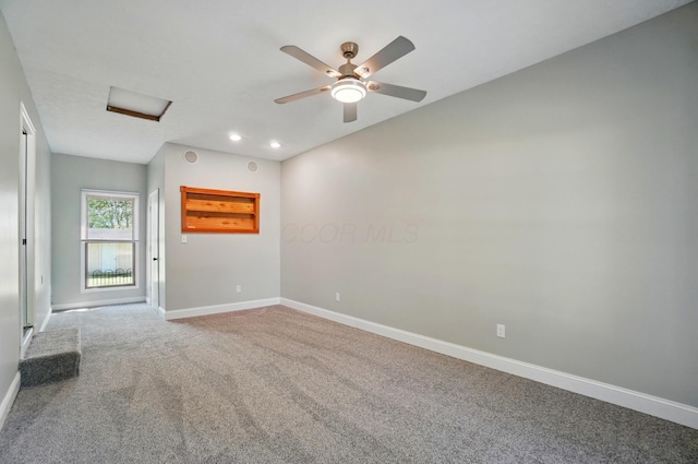 135 N Creekview Ct, Baltimore, OH 43105 - spare room with attic access, baseboards, carpet flooring, recessed lighting, and a ceiling fan