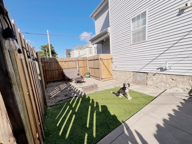 view of yard with a patio area