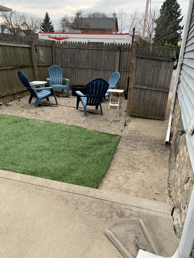 view of yard with fence and a patio area