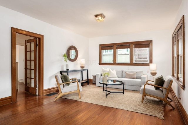 living room with wood finished floors and baseboards