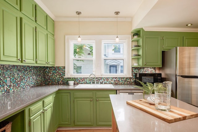 kitchen with a sink, black microwave, open shelves, pendant lighting, and light countertops