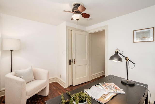 office area featuring wood finished floors, a ceiling fan, and baseboards