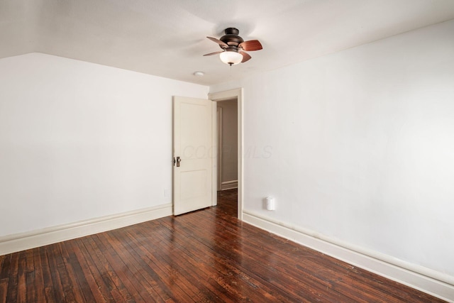 unfurnished room featuring a ceiling fan, wood-type flooring, and baseboards