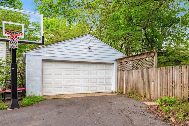 detached garage with fence