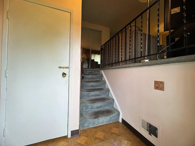 3457 Petzinger Rd, Columbus, OH 43232 - stairway featuring baseboards