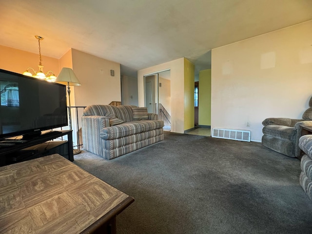 3457 Petzinger Rd, Columbus, OH 43232 - carpeted living area featuring a chandelier and baseboards