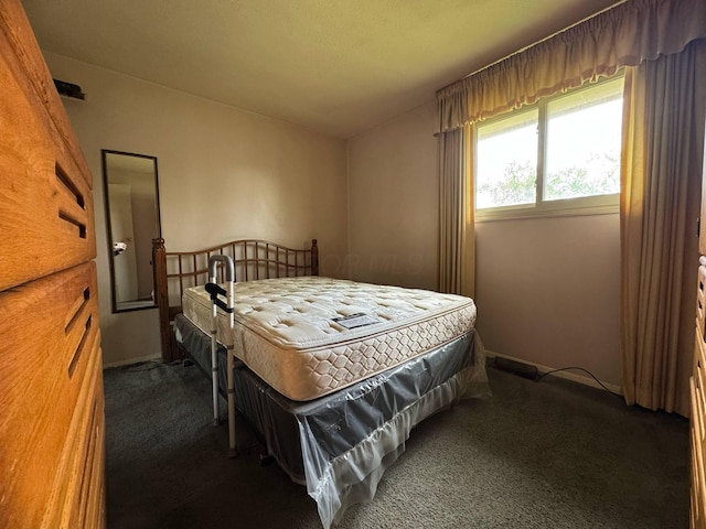 3457 Petzinger Rd, Columbus, OH 43232 - bedroom featuring dark carpet