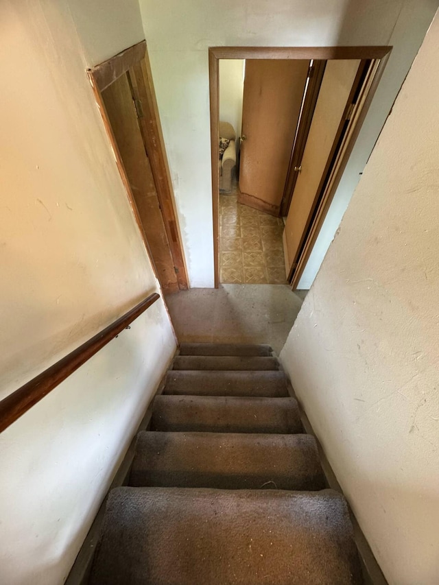3457 Petzinger Rd, Columbus, OH 43232 - stairs featuring tile patterned floors