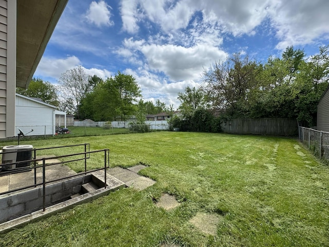 3457 Petzinger Rd, Columbus, OH 43232 - view of yard featuring central AC unit