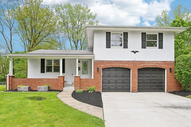 500 Cherrington Ct, Westerville, OH 43081 - split level home featuring brick siding, an attached garage, a front lawn, and stucco siding