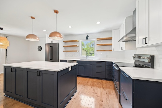 500 Cherrington Ct, Westerville, OH 43081 - kitchen featuring stainless steel appliances, open shelves, a sink, light wood-style floors, and a kitchen island